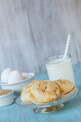 Apple Hand Pies With Milk and Eggs On Antique Plate