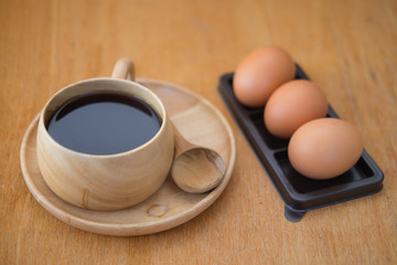 Soft-boiled egg with hot coffee