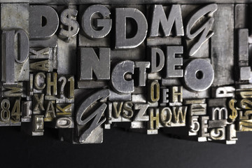 Historical letterpress types, also called as lead letters. These kind of letters were used in Gutenberg presses. These letters were the beginning of typography. And were used in typesetting