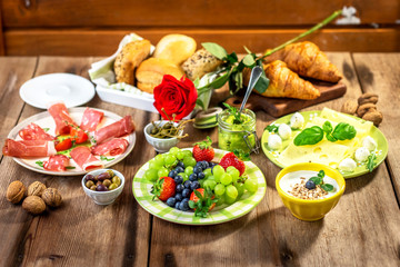 Breakfast served with fruit, croissants,cheese and sausage