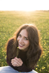 Pretty smiling girl relaxing outdoor