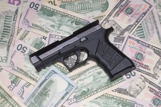 handgun and money glowing