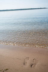 Footprints In Sand Lake Michigan Beach Vertical
