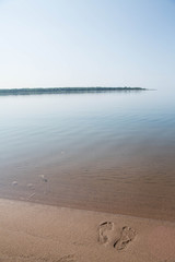 Footprints In Sand Lake Michigan Beach Shore Vertical
