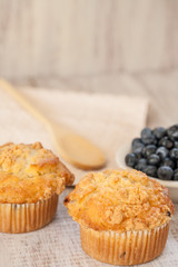 Blueberry Muffins Breakfast with Blueberries and Wood Spoon