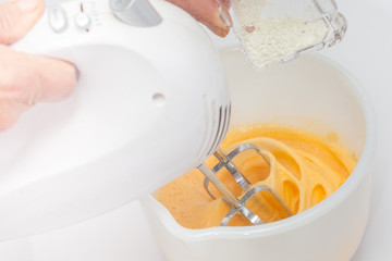 Omelet preparation : Whisking eggs and adding ingredients