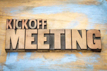 Kickoff meeting word abstract in wood type - obrazy, fototapety, plakaty