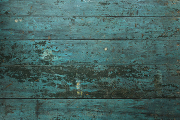 Old turquoise rustic wood planks texture background.