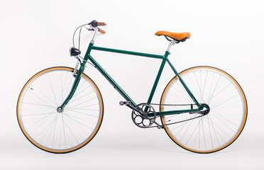 Vintage retro styled bicycle on white background