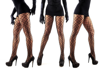 Sexy female legs in beautiful stylish stockings and high heels shoes, black gloves and dress,...