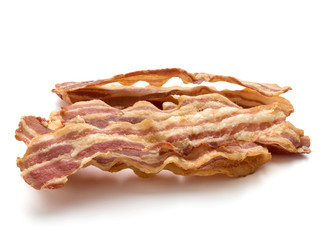 cooked crispy slices of bacon isolated on white background