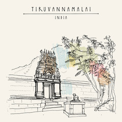 Tiruvannamalai, Tamil Nadu, India. Hindu temple, Arunachala holy mountain, tropical tree,, holy cow statue