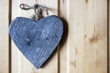Wooden heart on wall