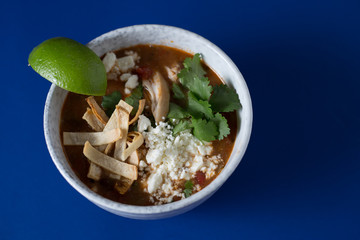 Chicken Tortilla Soup on Blue Background