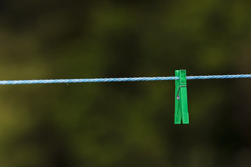 Clothes pin isolated on rope