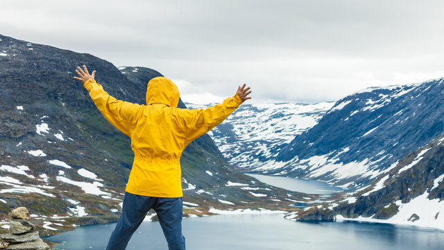 Tourist man standing by Djupvatnet lake, Norway