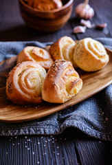 Baked savory bread rolls stuffed with garlic