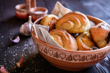 Baked savory bread rolls stuffed with garlic