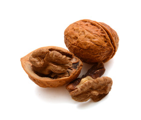 Cracked walnuts isolated on white background
