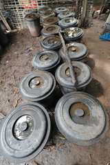 Lao-Lao whiskey distillery-row of barrels-MuangKhua to PakNamNoy road-Phongsali province-Laos. 3625