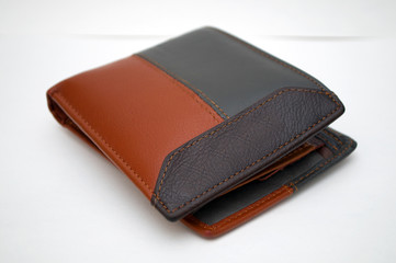 Photographing black and brown wallet on a white background