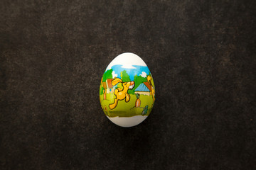 Easter egg with rabbit picture on it.