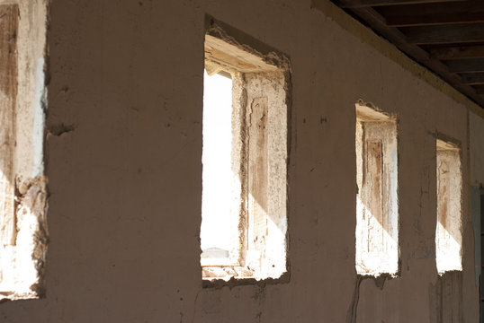 Row of windows in an abandoned building