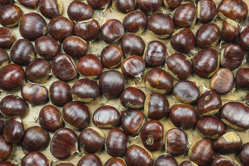 chestnuts on a wooden table top view