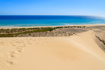 Fototapeta na wymiar Footprints on sand dune on Sotavento beach on Jandia peninsula, Fuerteventura, Canary Islands, Spain