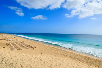 Fototapeta na wymiar Beautiful sand beach in Morro Jable town on Jandia peninsula, Fuerteventura, Canary Islands, Spain