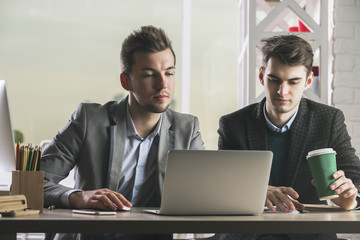 Two men in office