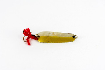 Exhibition of self-made fishing metal lures. Bait for fishing in the shape of a spoon with a hook...