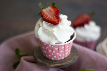 Cupcake with fresh strawberries. Delicious, dessert