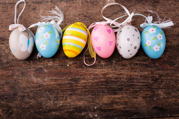 easter eggs on rustic wooden background