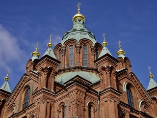 Fototapeta na wymiar Uspenski cathedral under the blue sky, Helsinki, Finland
