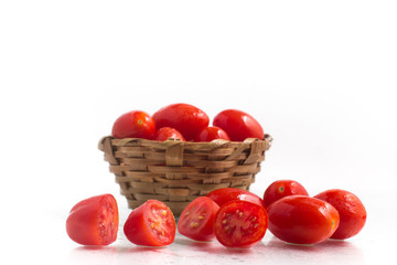 Cherry Tomatoes into a basket