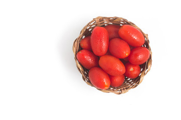 Cherry Tomatoes into a basket