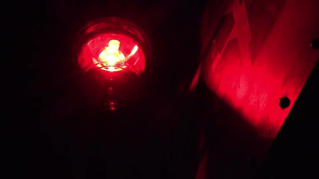 Illuminated revolving emergency signal
