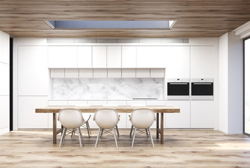 Marble kitchen with a long table