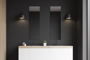 Double sink, black wall
