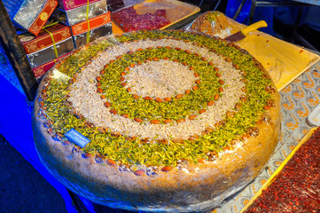 oriental sweets, big round cake with nuts and dried fruits