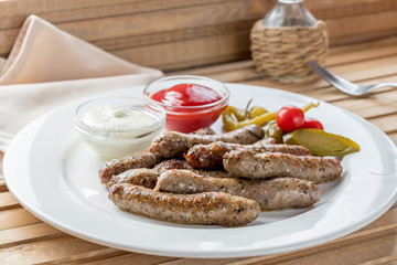 grilled sausages of lamb