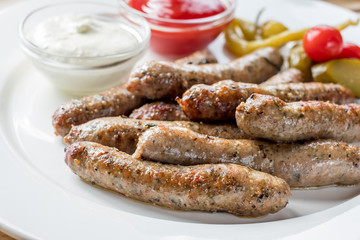 grilled sausages of lamb