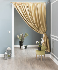 grey wall decoration and green chair modern background