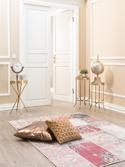 pillows on the carpet decorative stands and modern background interior concept