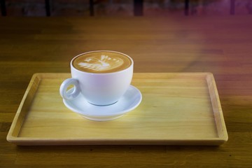 coffee on wooden tray