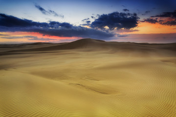 Fototapeta na wymiar Sand dune Rise red