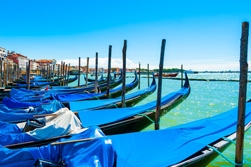Fototapeta na wymiar Gondolas on Canal in Venice Italy