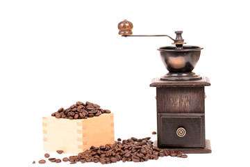 manual coffee grinder and coffee bean on white background