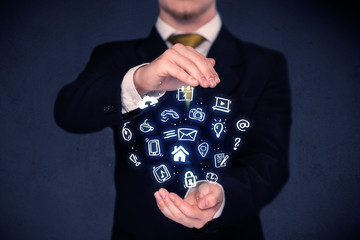 Businessman holding blue applications